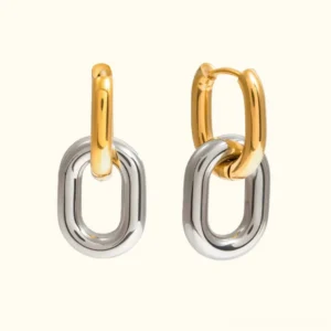 18K gold and silver two-tone double hoop earrings flat lay view showing interlocking oval links on beige background