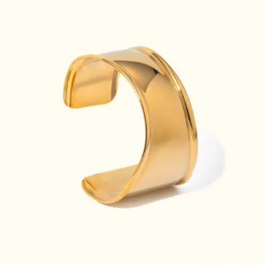 18K gold smooth open cuff bracelet with polished finish displayed on plain background, showcasing the sleek sculptural design and reflective surface