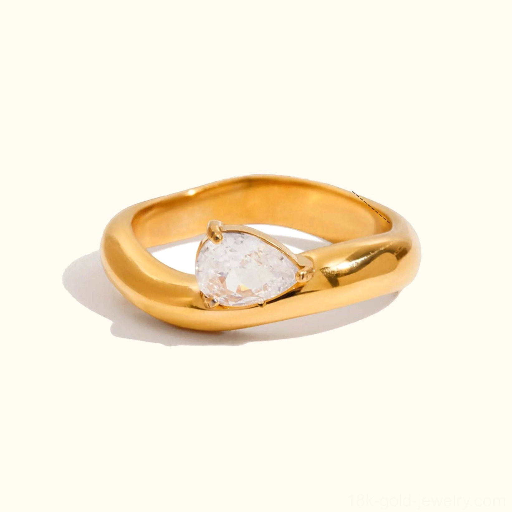 18K gold stackable ring collection detail shot showing twisted band texture and diamond simulant clarity