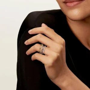 18K Gold Stacked Diamond Ring Worn on Hand - Close-Up Side View of Stackable Rings on Female Model