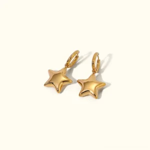 18K gold star drop huggie earrings front flat lay view on plain light background showing polished smooth 3D star pendant