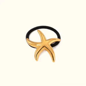 18K gold starfish hair cuff with polished metal finish front flat lay view on white background