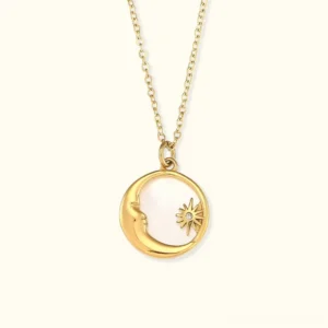18K gold sun and moon necklace with mother-of-pearl pendant, front flat lay close-up showing intricate gold cable chain and celestial pendant design