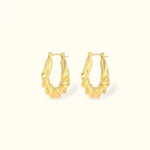 18K gold twisted hoop earrings front view flat lay on light background showing intricate twisted rope texture and warm gold tone