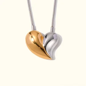 18K gold two-tone heart pendant necklace with yellow and white gold finish, polished snake chain on white background
