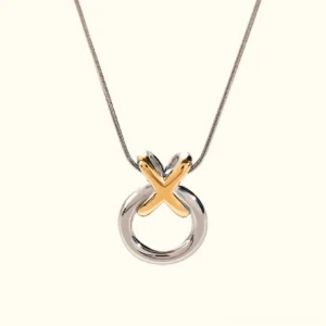18K gold two-tone ring knot pendant necklace close-up front view showing polished dual-tone hoop charm and snake chain detail