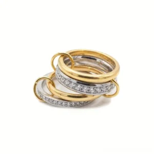 18K gold two-tone stacked diamond ring flat lay top view showing dual-tone gold and silver bands with diamond pavé details