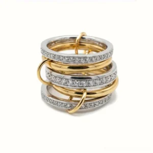 18K gold two-tone stacked diamond ring overhead flat lay view showing alternating gold and silver bands with diamond simulants