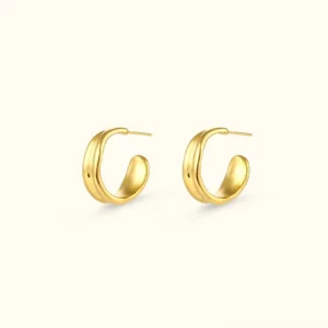 18K gold wave hoop earrings flat lay front view polished C-shaped design on beige background