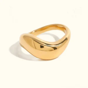 18K gold wavy band ring front flat lay overhead view polished finish white background