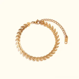 18k gold wheat leaf chain anklet flat lay display on white background showing delicate chain design with adjustable extender