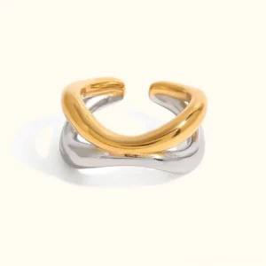 18K gold two-tone intertwined open ring flat lay view, showing dual-finish twisted design on neutral background