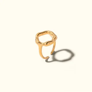 Artemis 18K gold wavy open ring front oblique view solid background minimalist design