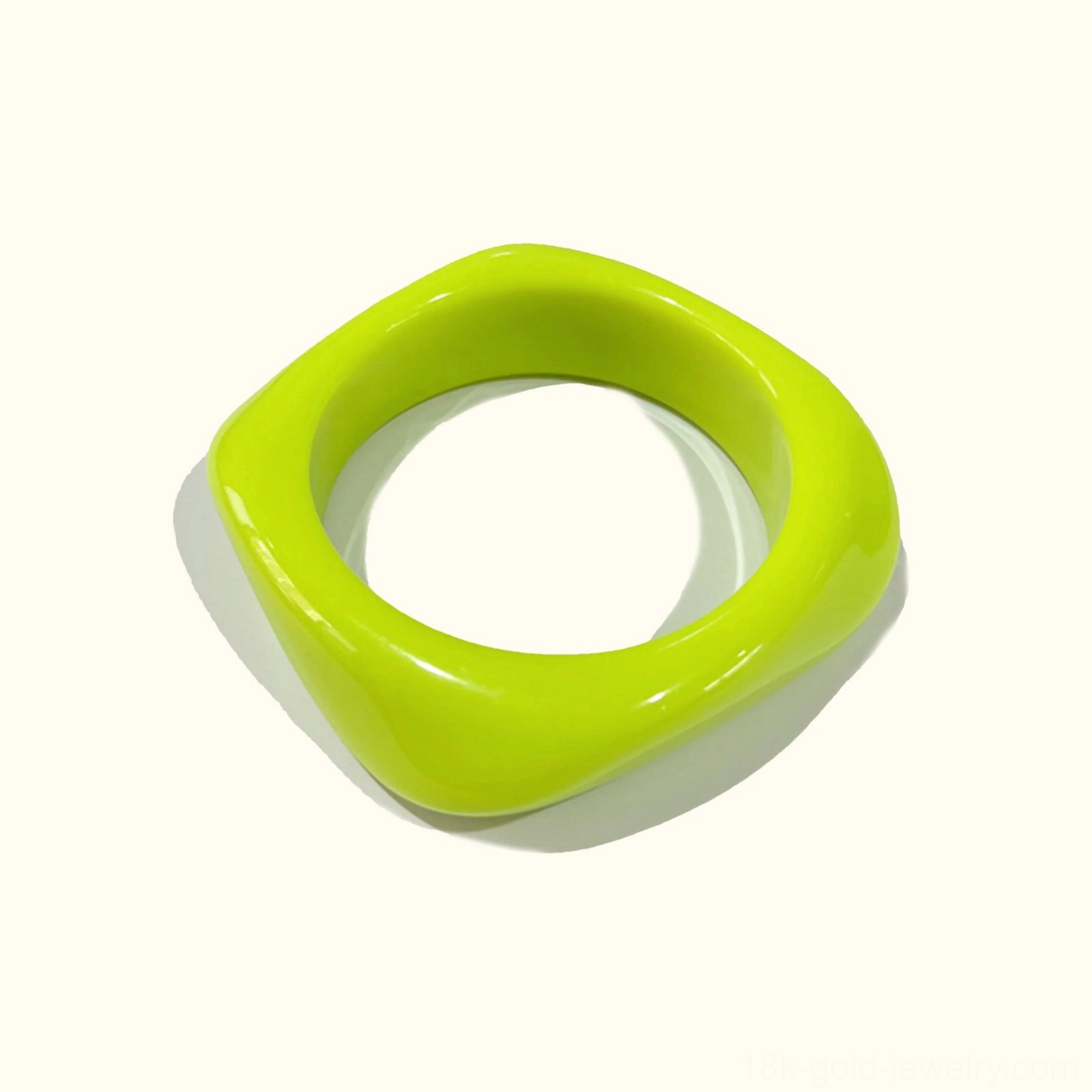 Citrus Lime neon bright green acrylic bangle bracelet, solid opaque rounded square shape in flat lay top-down perspective