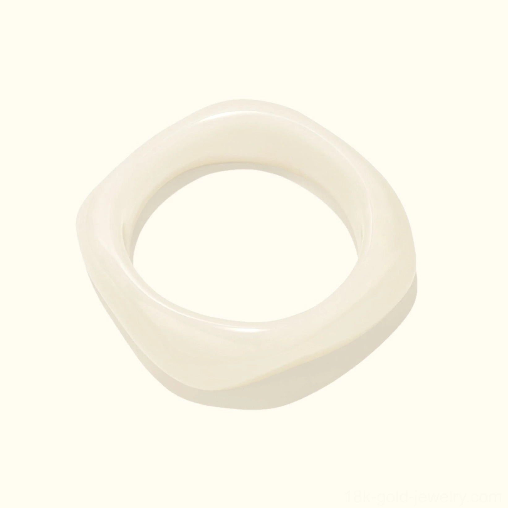 Cream off-white solid opaque acrylic bangle bracelet with neutral versatile finish, rounded square silhouette in flat lay view