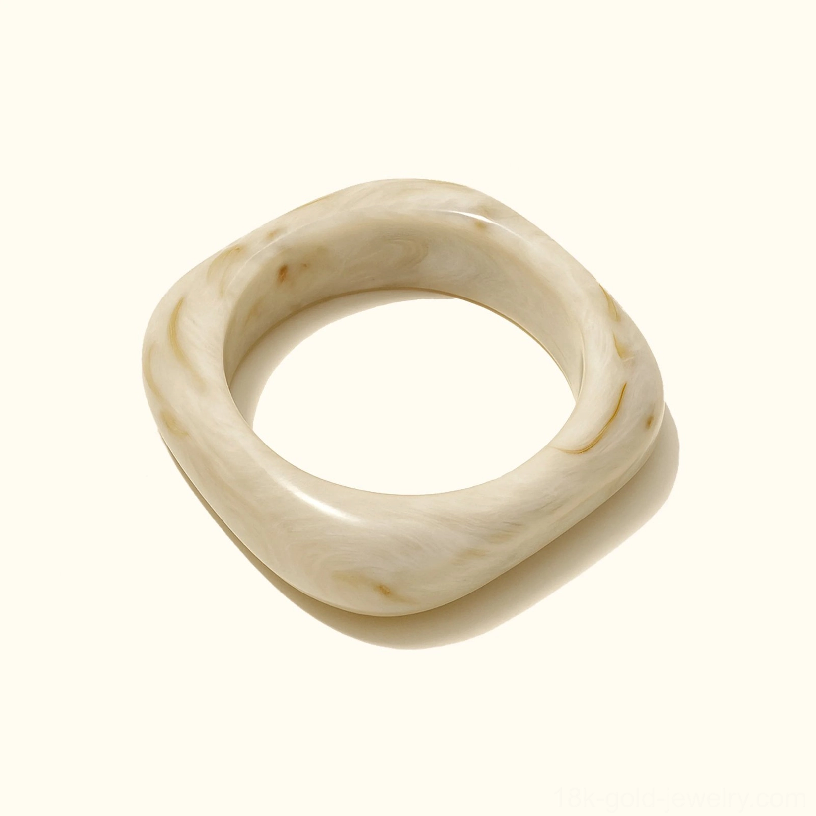 Marble Dream neutral marbled acrylic bangle bracelet with white organic veining, twisted rounded square design in flat lay view