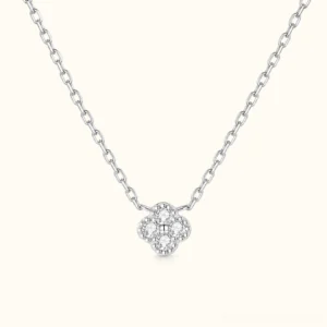 Silver Four-Leaf Clover Diamond Necklace with brilliant simulant stones in minimalist clover design, flat lay displaying elegant cable link chain